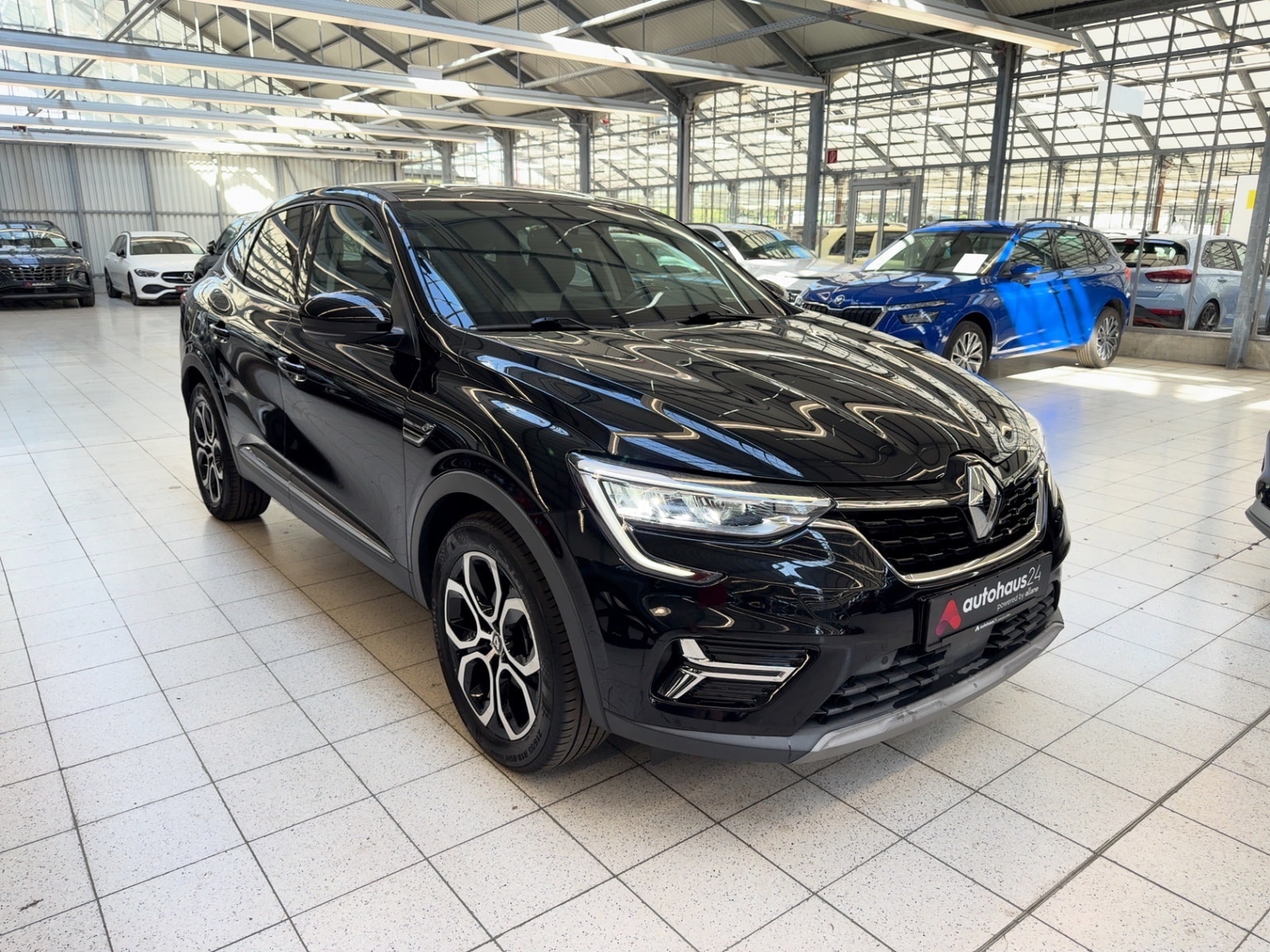 Renault Arkana SUV / Crossover / Geländewagen RENAULT Arkana E-TECH Hybrid 145 Intens Sports Utility Vehicle #1