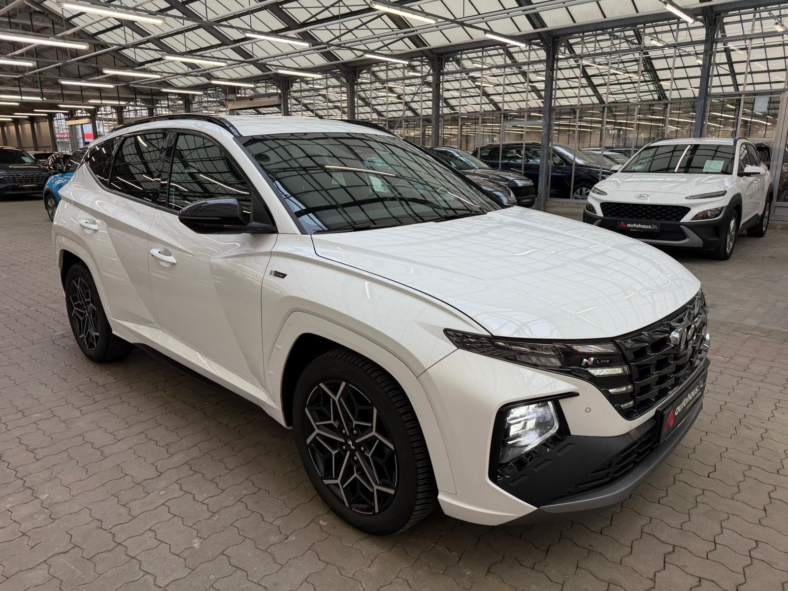 Hyundai Tucson SUV / Crossover / Geländewagen HYUNDAI Tucson 1.6 T-GDI 132kW 48V Select Sports Utility Vehicle #1